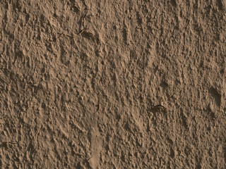 texture of a clay wall form a mud house