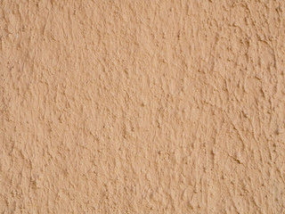 texture of a clay wall form a mud house