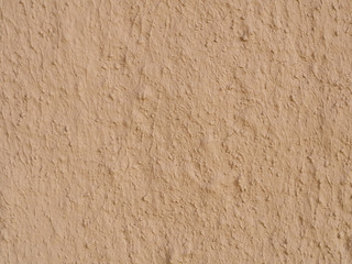 texture of a clay wall form a mud house