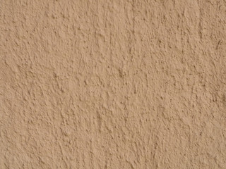 texture of a clay wall form a mud house