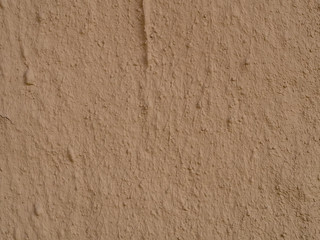 texture of a clay wall form a mud house