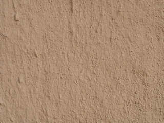 texture of a clay wall form a mud house