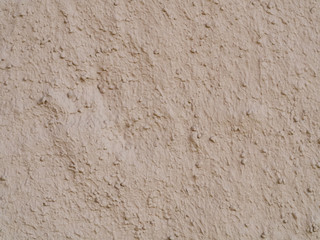 texture of a clay wall form a mud house