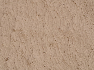 texture of a clay wall form a mud house