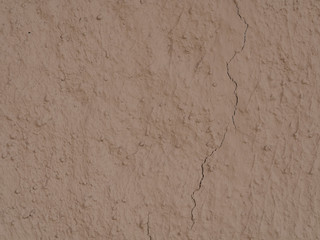 texture of a clay wall form a mud house