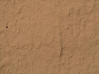 texture of a clay wall form a mud house