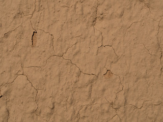 texture of a clay wall form a mud house