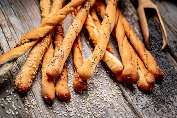 Bread sticks on a wooden background. Healthy food