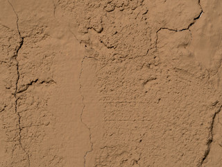 texture of a clay wall form a mud house