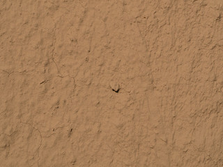 texture of a clay wall form a mud house