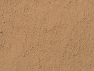 texture of a clay wall form a mud house