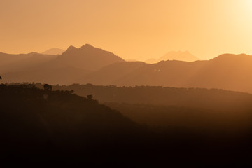 Sunset with mountains around AMAZING Ronda village, SPAIN