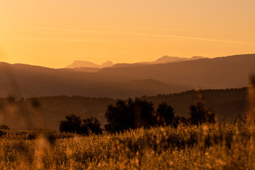 Sunset with mountains around AMAZING Ronda village, SPAIN