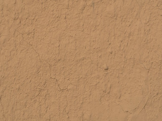 texture of a clay wall form a mud house