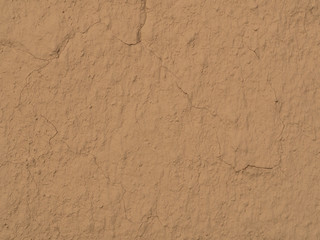 texture of a clay wall form a mud house