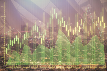 Financial graph on night city scape with tall buildings background double exposure. Analysis concept.