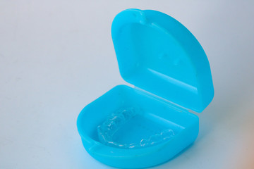 Macro close up of a plastic teethguard to stop wear due to teeth grinding at night.