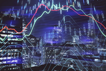 Financial graph on night city scape with tall buildings background multi exposure. Analysis concept.