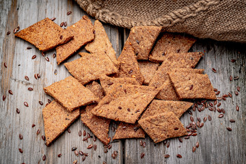 Salted crispy crackers with sesame and sunflower seeds