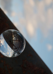 old steel beam and crystal ball 
