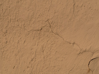 texture of a clay wall form a mud house