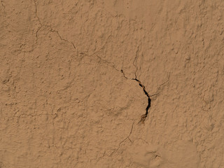 texture of a clay wall form a mud house