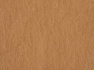 texture of a clay wall form a mud house