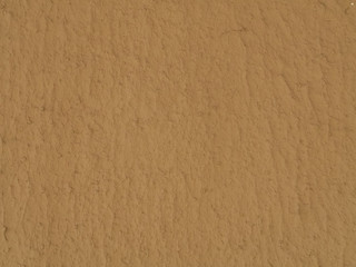 texture of a clay wall form a mud house