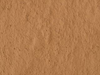 texture of a clay wall form a mud house