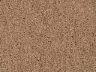 texture of a clay wall form a mud house