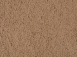 texture of a clay wall form a mud house
