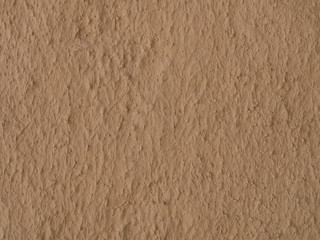 texture of a clay wall form a mud house