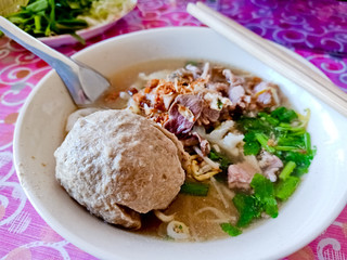 Tha instant noodle with big round pork and vetgetable