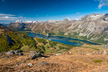 Naklejka na ściany i meble view of Lake Sils from Furtschellas in Engadin in Autumn
