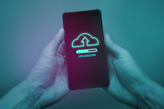 a man upload file to Cloud computing with smart phone