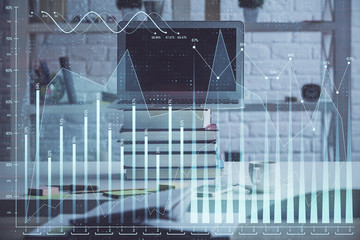 Forex market graph hologram and personal computer on background. Double exposure. Concept of investment.