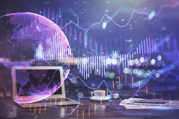 Financial market graph hologram and personal computer on background. Multi exposure. Concept of forex.