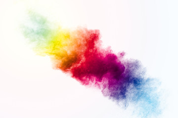 Colorful background of pastel powder explosion.Multi colored dust splash on white...