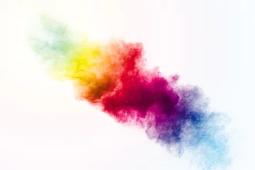 Poster Im Rahmen Colorful background of pastel powder explosion.Multi colored dust splash on white background.Painted Holi. © Pattadis