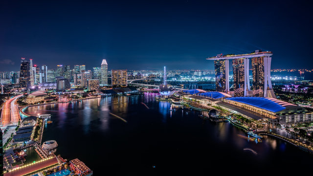 Panorama image of Singapore skyscrapers at night