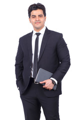 Portrait of handsome young businessman holding diary. Confident male professional standing on white...