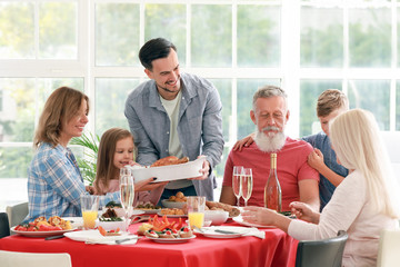 Big family having dinner at home