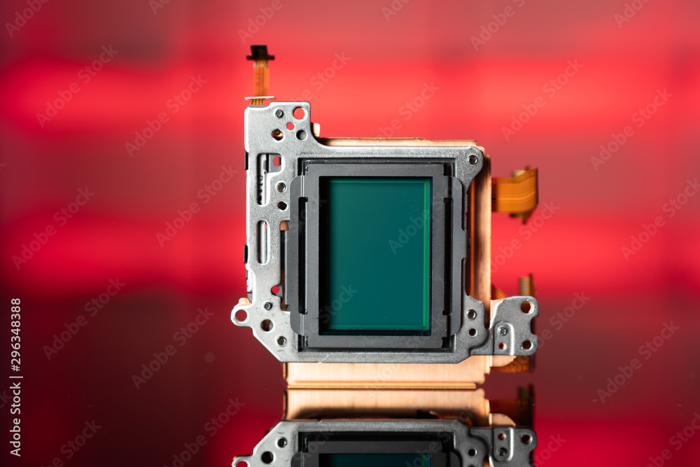 Poster modern cmos camera image sensor. digital dslr camera cmos sensor removed from camera.