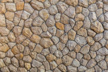 The stone wall texture background natural color.Background of stone wall texture photo.Natural stone wall texture for background. Old Brick texture, Grunge brick wall background.