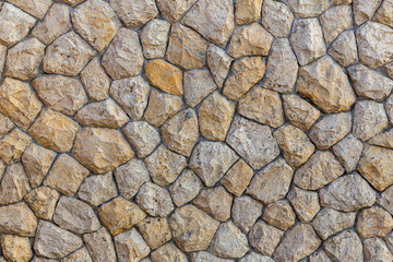 The stone wall texture background natural color.Background of stone wall texture photo.Natural stone wall texture for background. Old Brick texture, Grunge brick wall background.