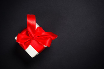 Present box on black background.