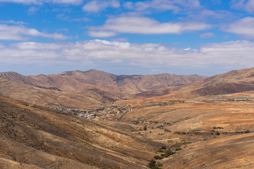 A wide view over the landscape of the canary island Fuerteventura - 296349397