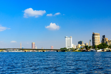 Residential and office buildings of the Cairo city. View from Nile river