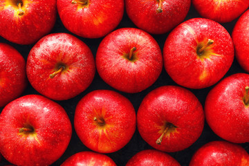 Many ripe apples as background