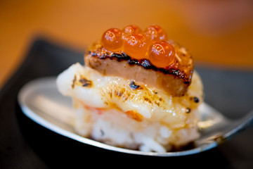 Close up Botan Shrimp and Foie Gras Truffles sushi.